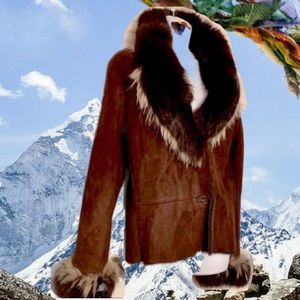 Shearling Lambskin with Fox Fur & Coyote Trim shearling lining.